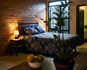 Vuode tai vuoteita majoituspaikassa La Posada Copan