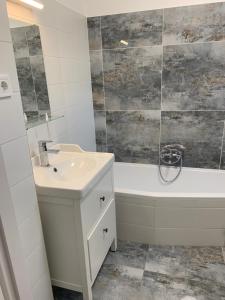 Kúpeľňa v ubytovaní TópART Apartman C