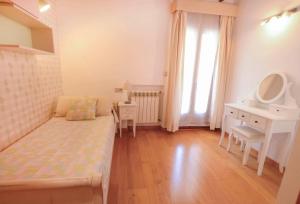 Łóżko lub łóżka w pokoju w obiekcie Casa Paquita