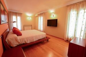 Telewizja i/lub zestaw kina domowego w obiekcie Casa Paquita