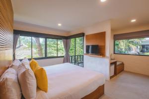 Postel nebo postele na pokoji v ubytování Punnpreeda Beach Resort - SHA Plus Certified