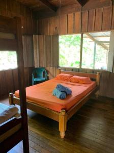 Postel nebo postele na pokoji v ubytování Agradable cabaña frente al mar