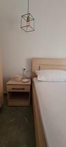 Krevet ili kreveti u jedinici u okviru objekta Camping Corali & Apartments