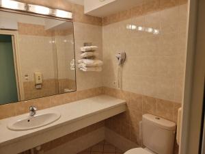 Koupelna v ubytování L'AUBERGE DE L'OLIVE