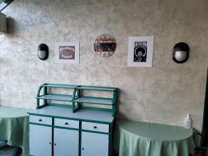 Postel nebo postele na pokoji v ubytování L'AUBERGE DE L'OLIVE