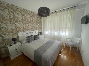A bed or beds in a room at El valluelo