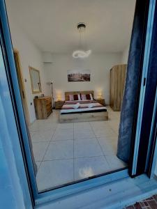 Кровать или кровати в номере house in the village +13 фотографий