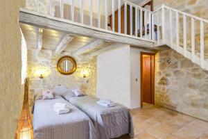 Posteľ alebo postele v izbe v ubytovaní Villa Vincenzos by Villa Plus