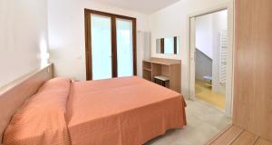 Ένα ή περισσότερα κρεβάτια σε δωμάτιο στο La Villa Elisabeth