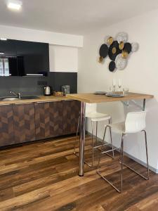Kuchyň nebo kuchyňský kout v ubytování FiftyShades Apartmán s vířivkou