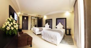 Postel nebo postele na pokoji v ubytování Tempoo Hotel Marrakech City Centre Adults Only