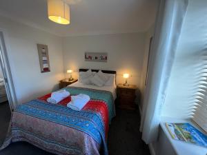 Postel nebo postele na pokoji v ubytování Anchor Hotel