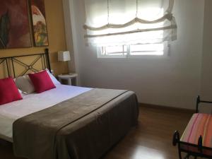 Posteľ alebo postele v izbe v ubytovaní Vivienda Turistica Play Puntamar Punta Umbria