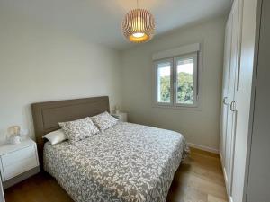 Posteľ alebo postele v izbe v ubytovaní Precioso y acogedor apto. en Noia. Recién renovado
