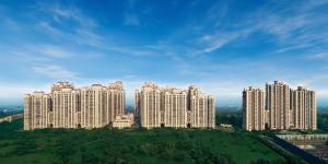 a group of tall buildings on top of a hill at Luxury Furnish Studio Apt 623 in DLF Moti Nagar Delhi in New Delhi