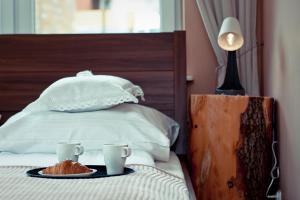 Łóżko lub łóżka w pokoju w obiekcie Apartament Giencyno Koncina Zakopane