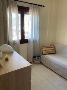 Postel nebo postele na pokoji v ubytování Nikiti Seaview Apartment