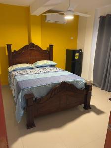 Postel nebo postele na pokoji v ubytování Hotel Gazcue