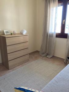 Postel nebo postele na pokoji v ubytování Nikiti Seaview Apartment