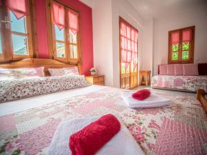 A bed or beds in a room at Cherry House in Damouchari with a sea view - Delicious Houses