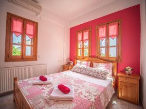 A bed or beds in a room at Cherry House in Damouchari with a sea view - Delicious Houses