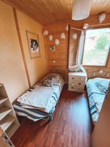 Postel nebo postele na pokoji v ubytování Chalet cosy Ignaux - Ax les thermes
