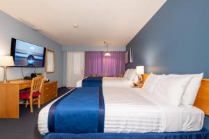 Postel nebo postele na pokoji v ubytování Ocean Crest Motel