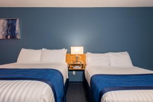 Postel nebo postele na pokoji v ubytování Ocean Crest Motel