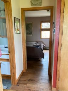 A bed or beds in a room at Pine Creek Cabin Livingston Montana