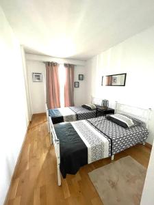 Posteľ alebo postele v izbe v ubytovaní Superbe appartement en centre-ville, 20min de Paris, 5 min d'Enghien