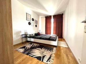 Posteľ alebo postele v izbe v ubytovaní Superbe appartement en centre-ville, 20min de Paris, 5 min d'Enghien