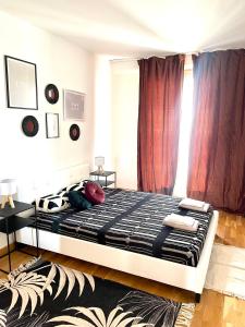 Posteľ alebo postele v izbe v ubytovaní Superbe appartement en centre-ville, 20min de Paris, 5 min d'Enghien