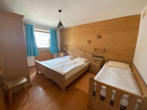 Posteľ alebo postele v izbe v ubytovaní Saskia Residence