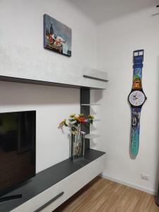 Televízia a/alebo spoločenská miestnosť v ubytovaní ETRA Casa Vacanza