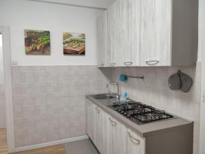 Kuchyňa alebo kuchynka v ubytovaní ETRA Casa Vacanza