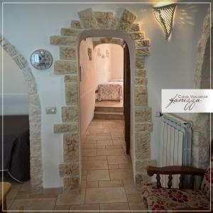 Postel nebo postele na pokoji v ubytování Trullo Fanizza