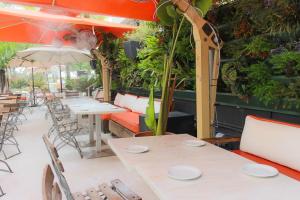 Restoran või mõni muu söögikoht majutusasutuses Hotel Breakwater South Beach