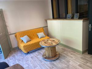 Posedenie v ubytovaní Appartement en Rez de jardin