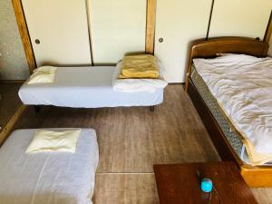 Postel nebo postele na pokoji v ubytování Guesthouse Nichinan - Vacation STAY 82913v