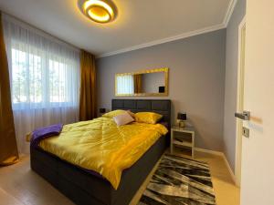 Postel nebo postele na pokoji v ubytování Lux Nanea Apartment