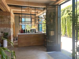 a kitchen with a glass shower and a counter at Istanbul Old City Colorful Houses Balat PETRION Hotel in Istanbul