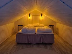Ліжко або ліжка в номері Pinebo Palace Guesthouse