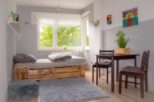 Posedenie v ubytovaní Apartament Grunwaldzka przy Łynie + 6 fotografií