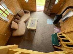 an overhead view of a living room in a tiny house at Forest Guest House 2 in Sîntimbru-Băi