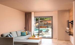 A seating area at Sissi Lux Villas