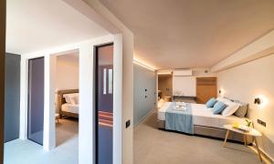 A bed or beds in a room at Sissi Lux Villas