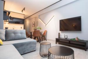TV a/nebo společenská místnost v ubytování Luxury Premium Suite #1