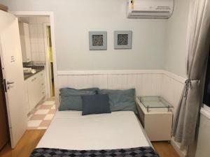 Ένα ή περισσότερα κρεβάτια σε δωμάτιο στο FamilyHome