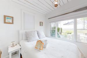Ένα ή περισσότερα κρεβάτια σε δωμάτιο στο Long Point Getaway