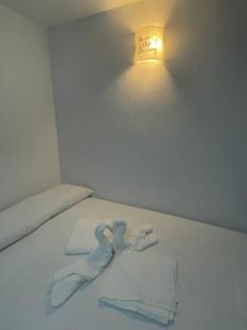 Postel nebo postele na pokoji v ubytování Loft Calypso